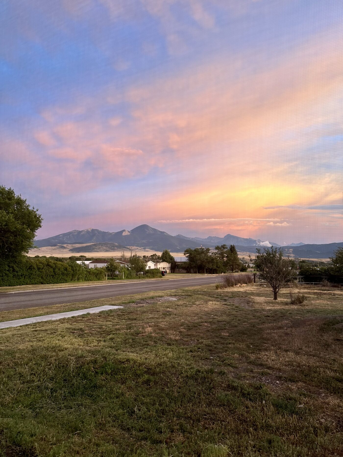 Pink sky over the Absarokas from the front lawn